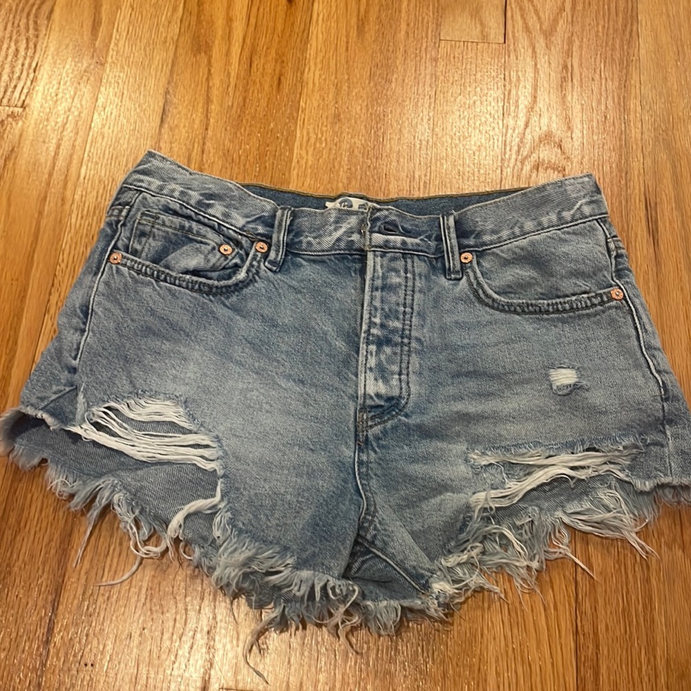 Free people loving good vibrations cutoff shorts light wash